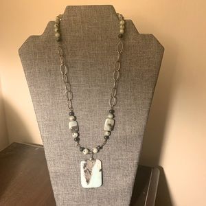 Natural kiwi jasper stone necklace. 20 inch chain. 1 1/2 pendant.